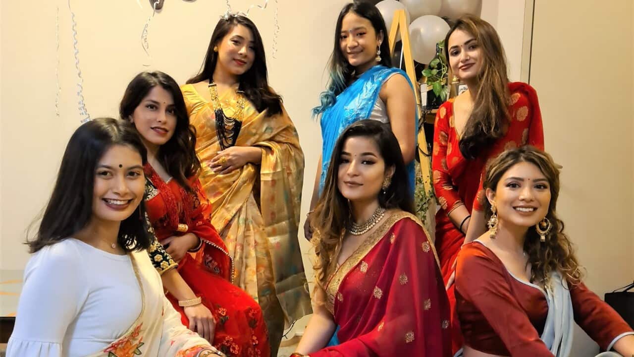 Ladies dressed in Sari