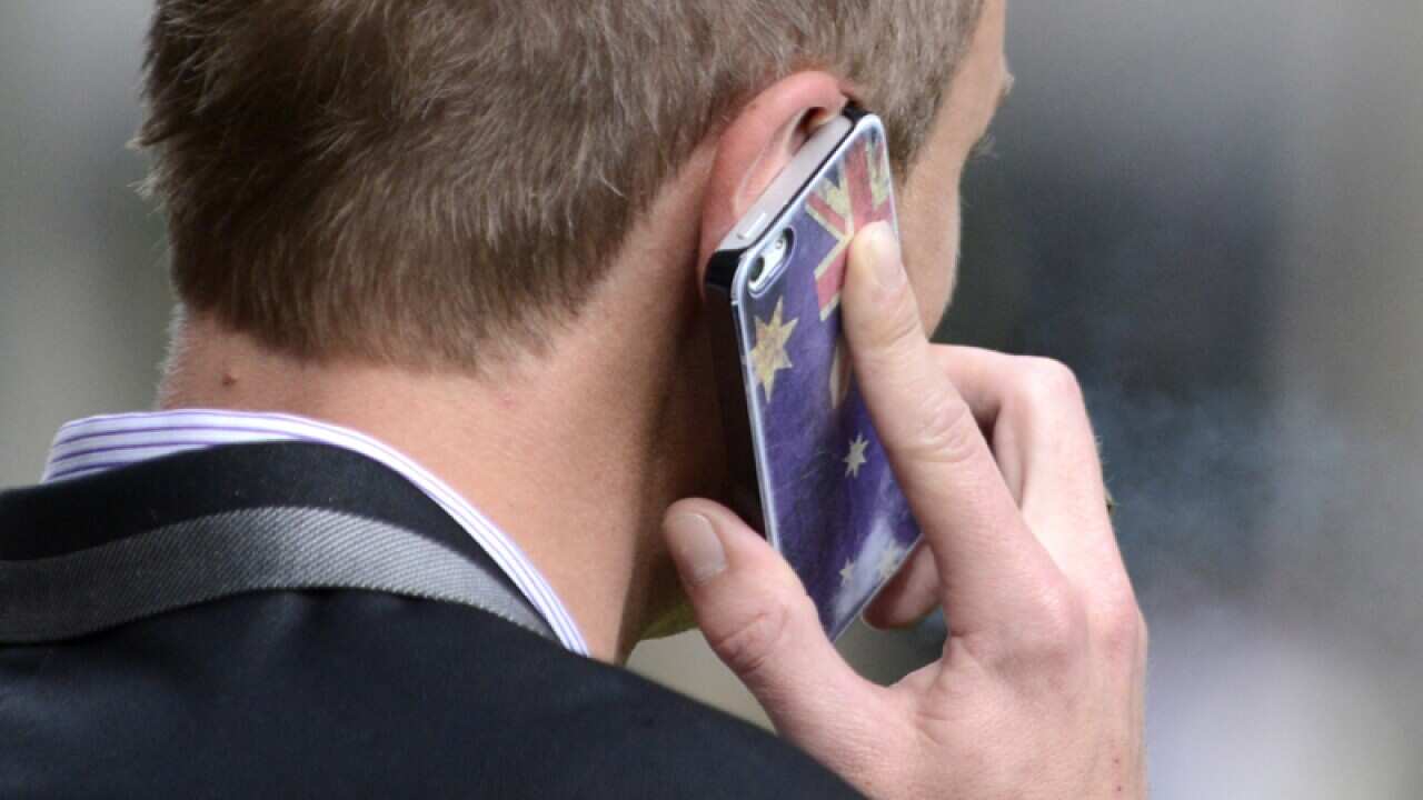 A man talks on his mobile phone in Brisbane