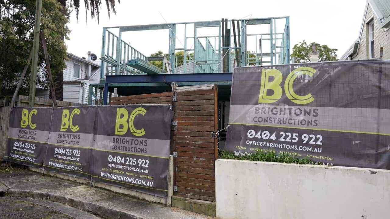 A house under construction sits idle in Sydney, Monday, March 28, 2022.