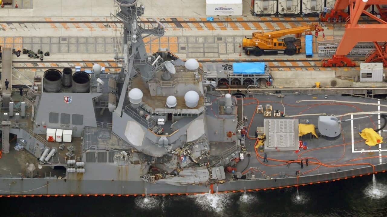 The damaged US Navy destroyer USS Fitzgerald is seen berthing at Yokosuka Naval Base in Yokosuka, south of Tokyo, Japan, 18 June 2017.