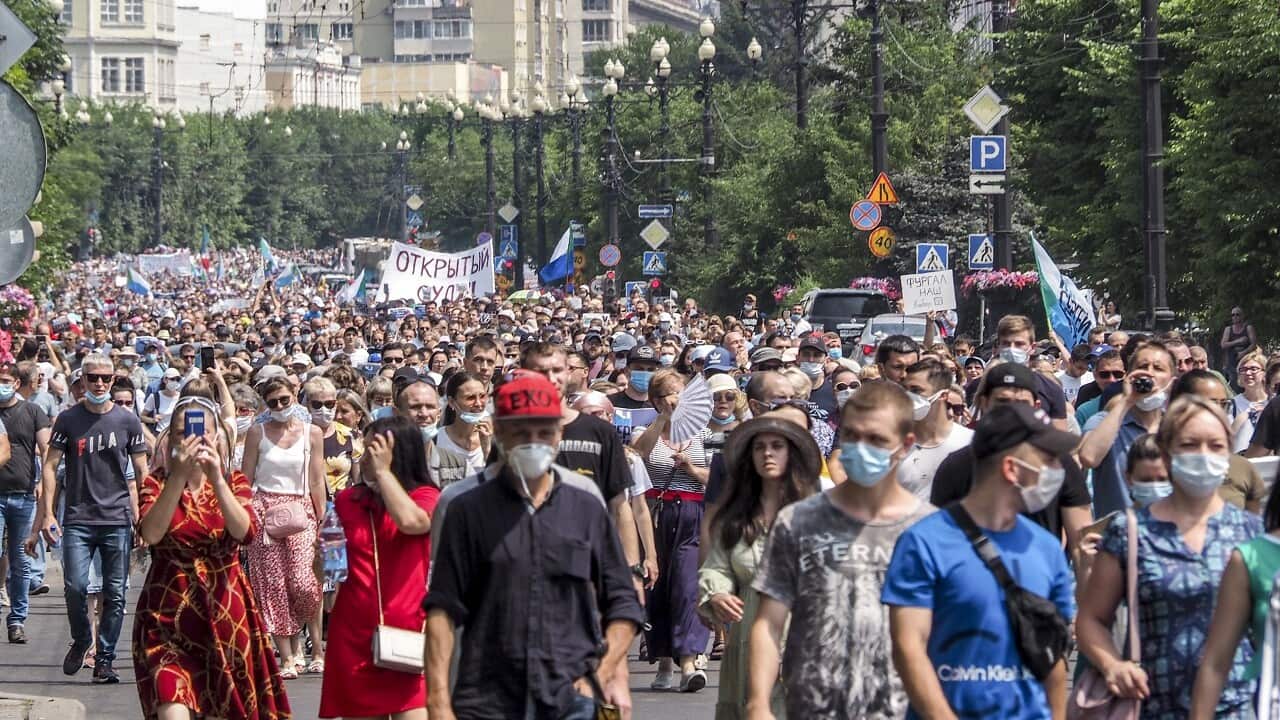 People march during an unsanctioned protest in support in Khabarovsk.