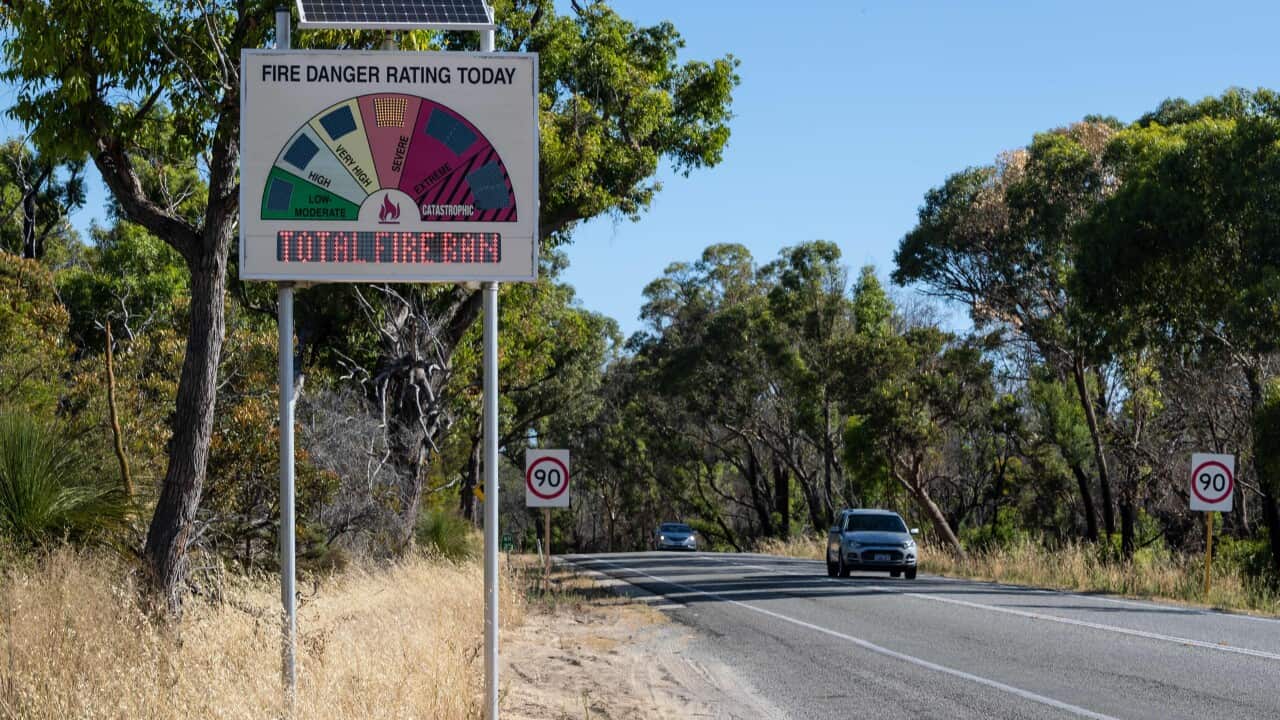 A roadside Fire Danger Rating sign indicating Severe conditions and a Total Fire Ban.