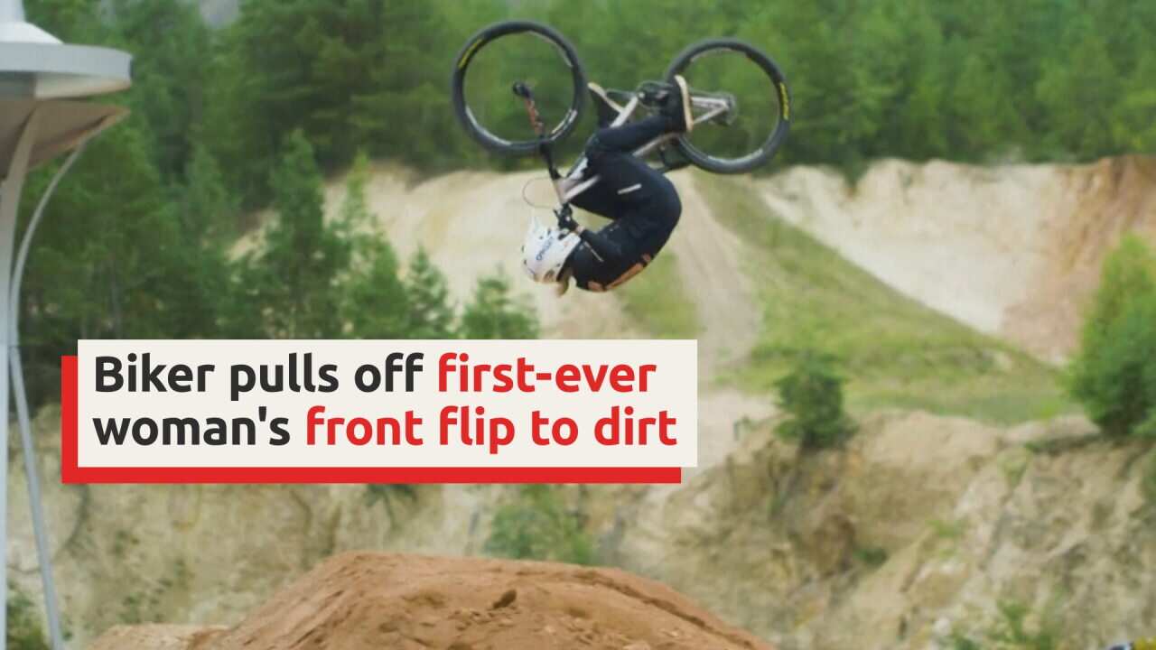 Biker pulls off first-ever woman's front flip to dirt