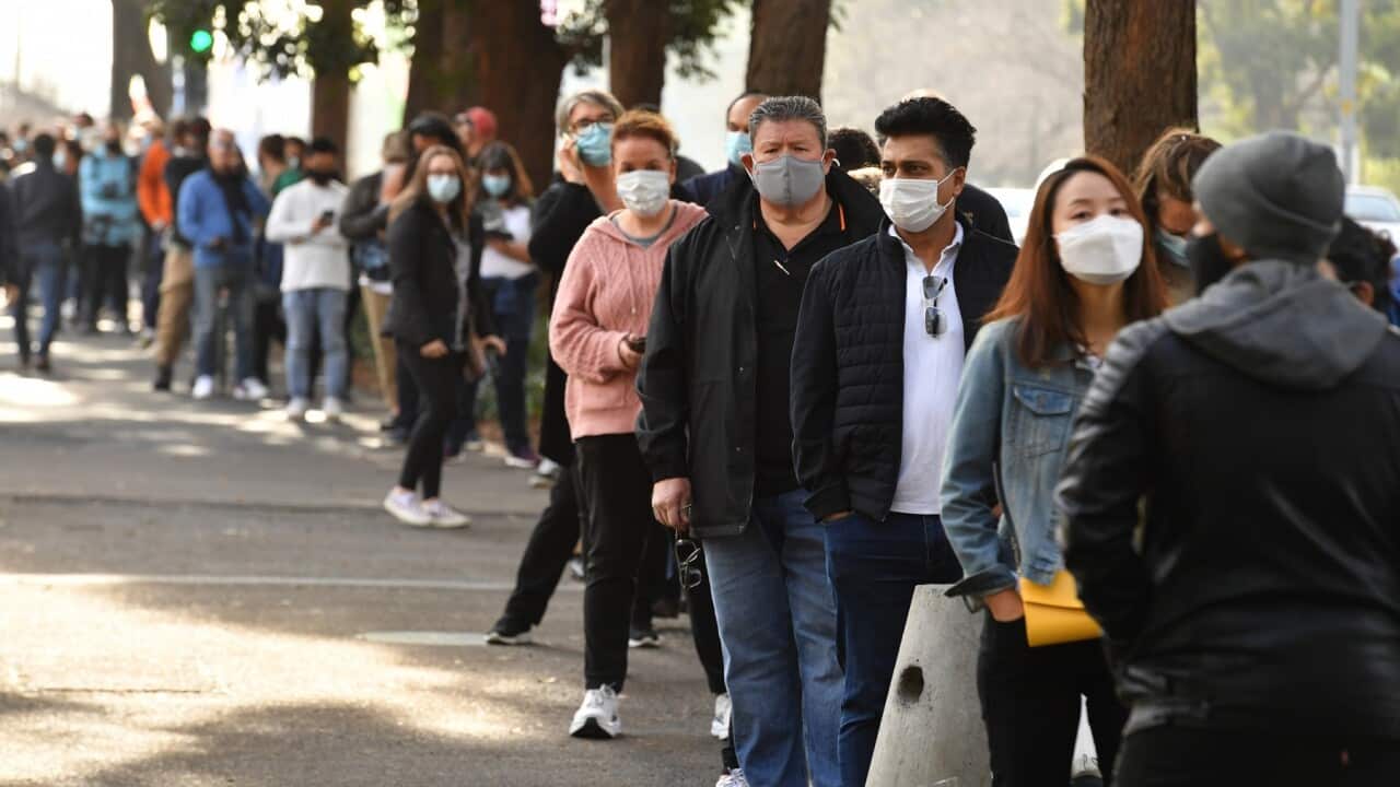 People queue at the NSW Vaccine Centre at Homebush Olympic Park in Sydney (AAP)