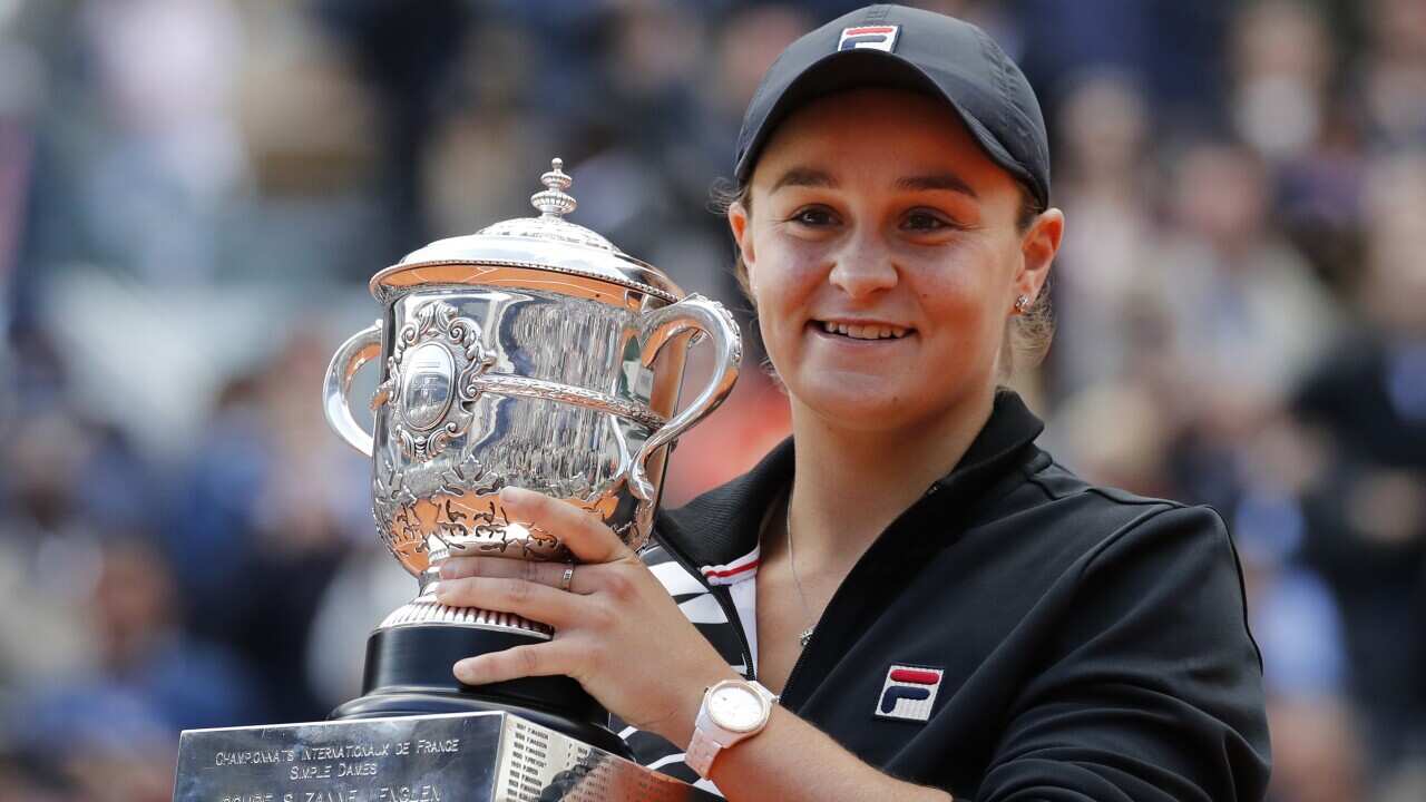 Ash Barty holds the trophy after winning the women's final match of last year's French Open