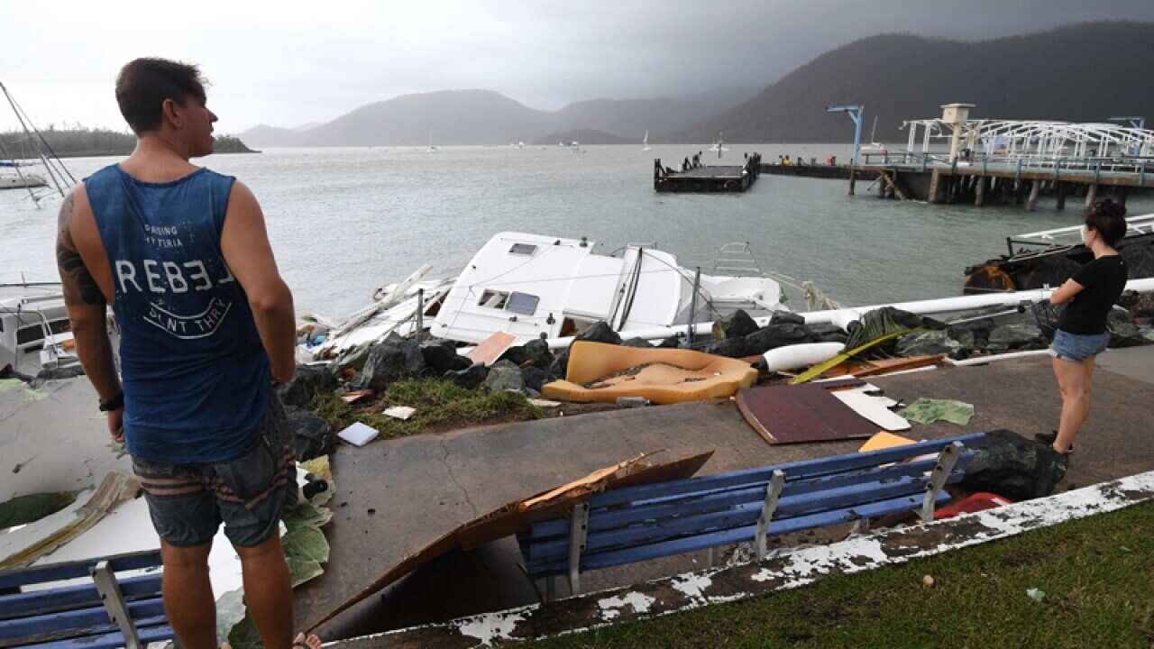 Locals inspect damage at Shute Harbour