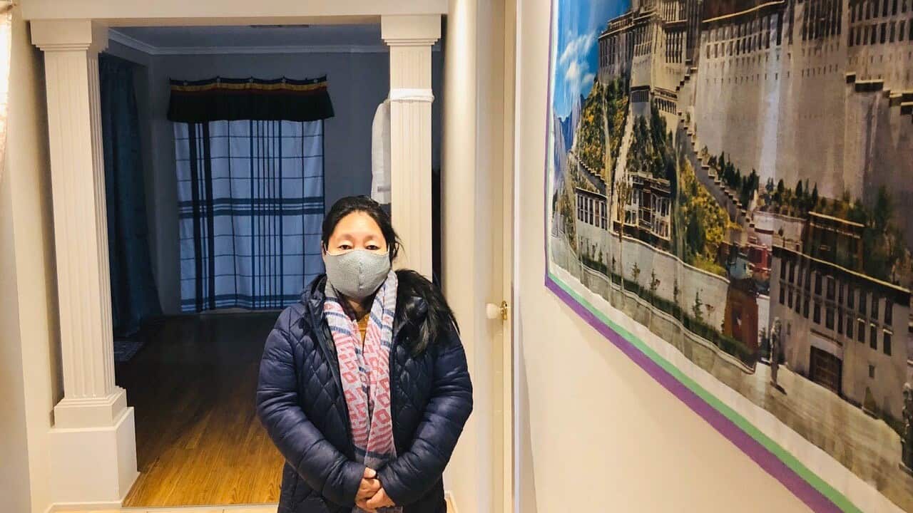 Melbourne based Tibetan mum, Lhakpa Choedon wearing her mask