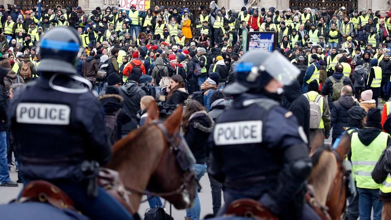 'Yellow Vests' face off with police in Paris for a fifth weekend of protesters.