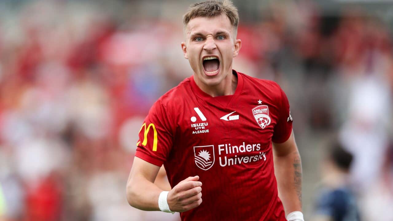 Luka Jovanovic of Adelaide United celebrates a goal during the A-League Men Round 2 match between Adelaide United and the Central Coast Mariners at Coopers Stadium in Adelaide