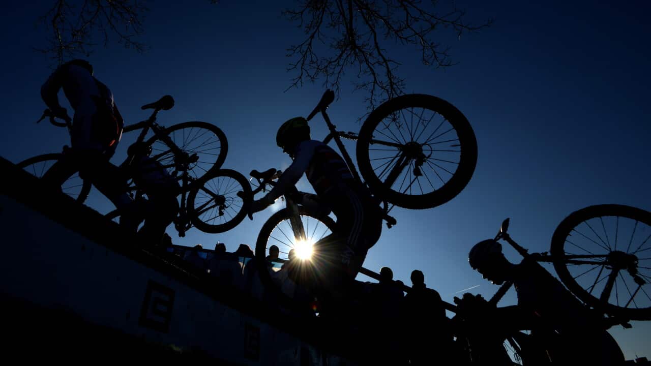 Athletes compete during the Men Under 23 race at the 2015 UCI cyclo-cross World championships