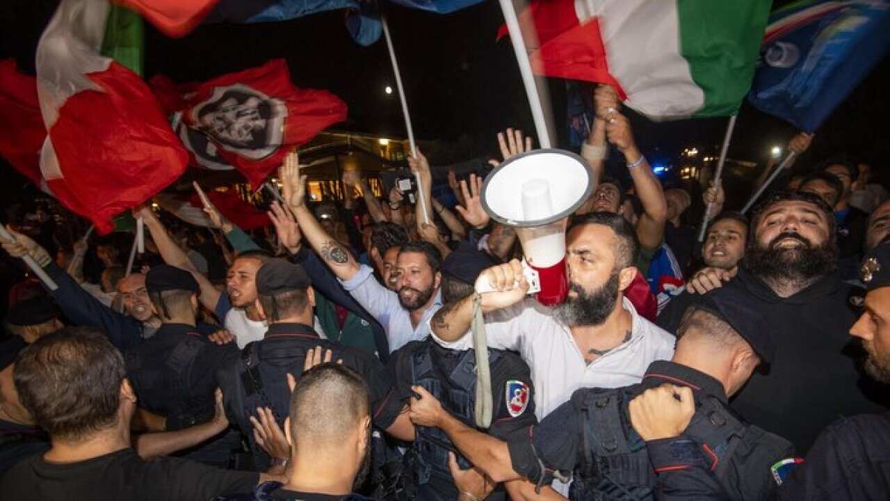 Protesters of right and extreme right movements rally outside the Catholic Church center 'Mondo Migliore'