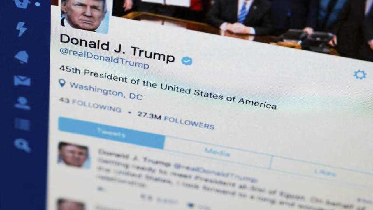 President Donald Trump's tweeter feed is photographed on a computer screen in Washington, Monday. April 3, 2017.