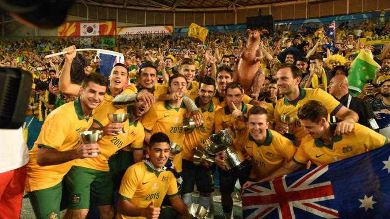 Australia celebrate their win over Korea Republic in the Final of the Asian Cup between Australia and Korea Republic at Stadium Australia in Sydney.