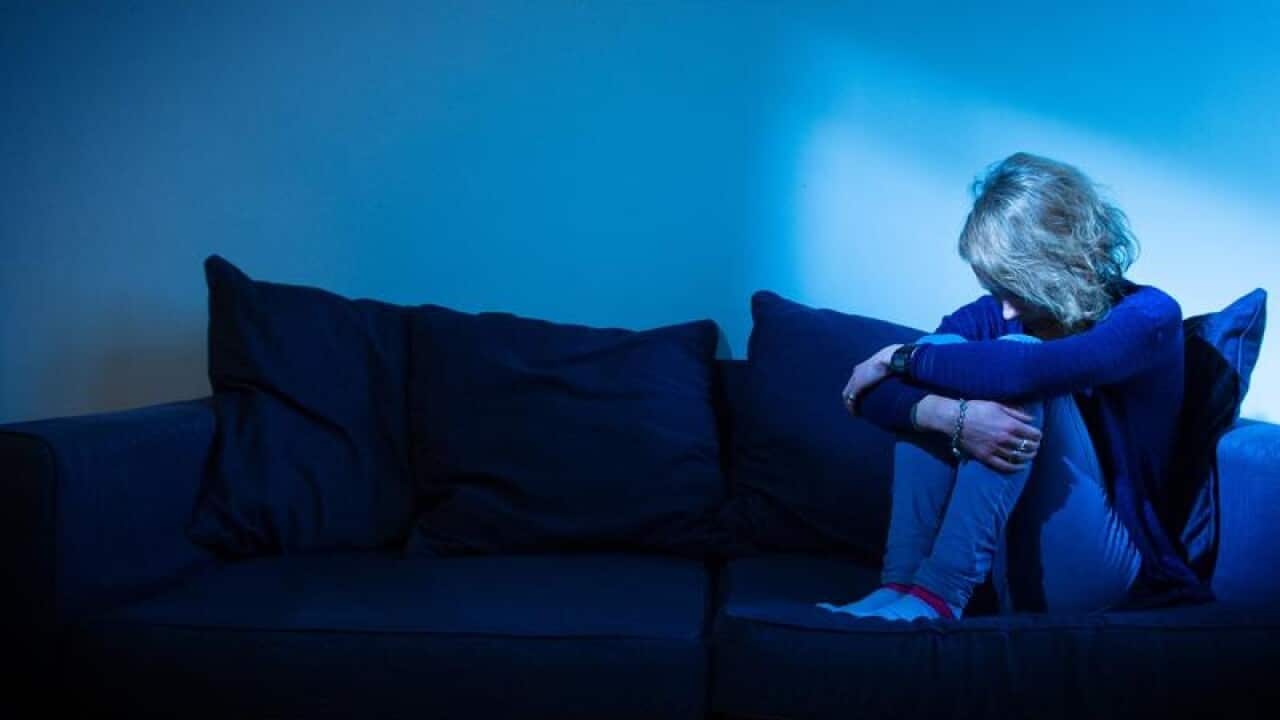 A woman showing signs of depression.