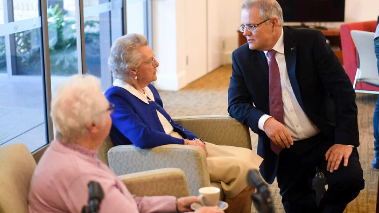Australian Prime Minister Scott Morrison speaks to residents during a visit to a Goodwin Retirement Village in Canberra, Wednesday, September 12, 2018. (AAP Image/Lukas Coch) NO ARCHIVING
