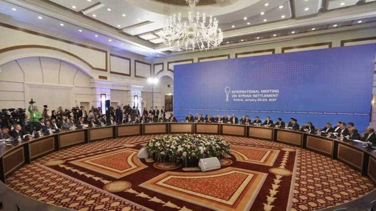 Delegations of Russia, Iran and Turkey hold talks on Syrian peace at a hotel in Astana, Kazakhstan