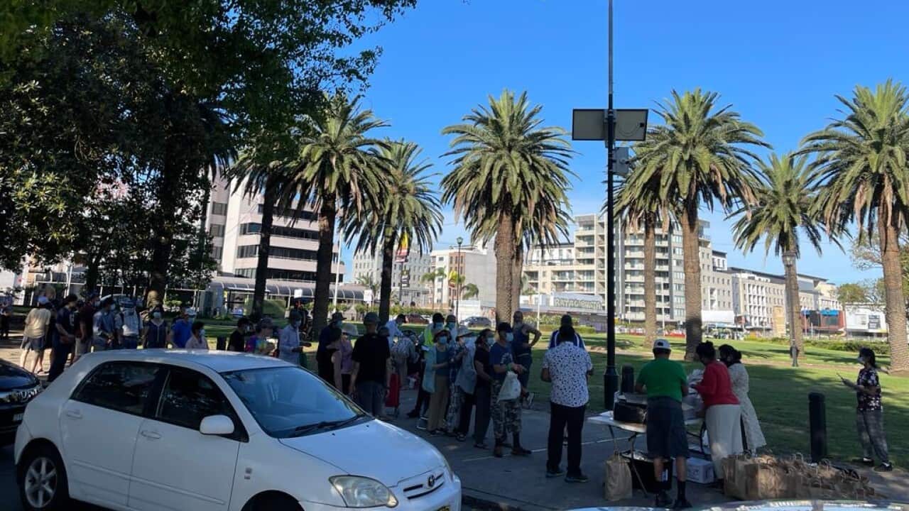 Language barrier prevents charity from understanding increase in elderly Asians queueing for food handouts.
