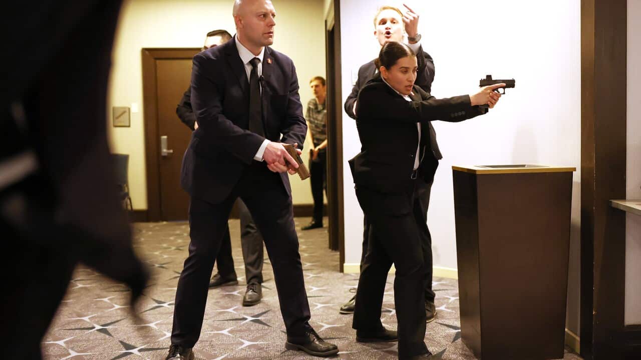 Secret service agents respond during the White House Correspondents Dinner,