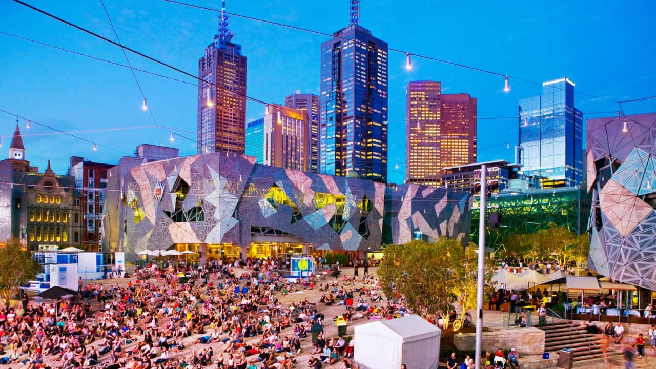 People in Federation Square, Melbourne.