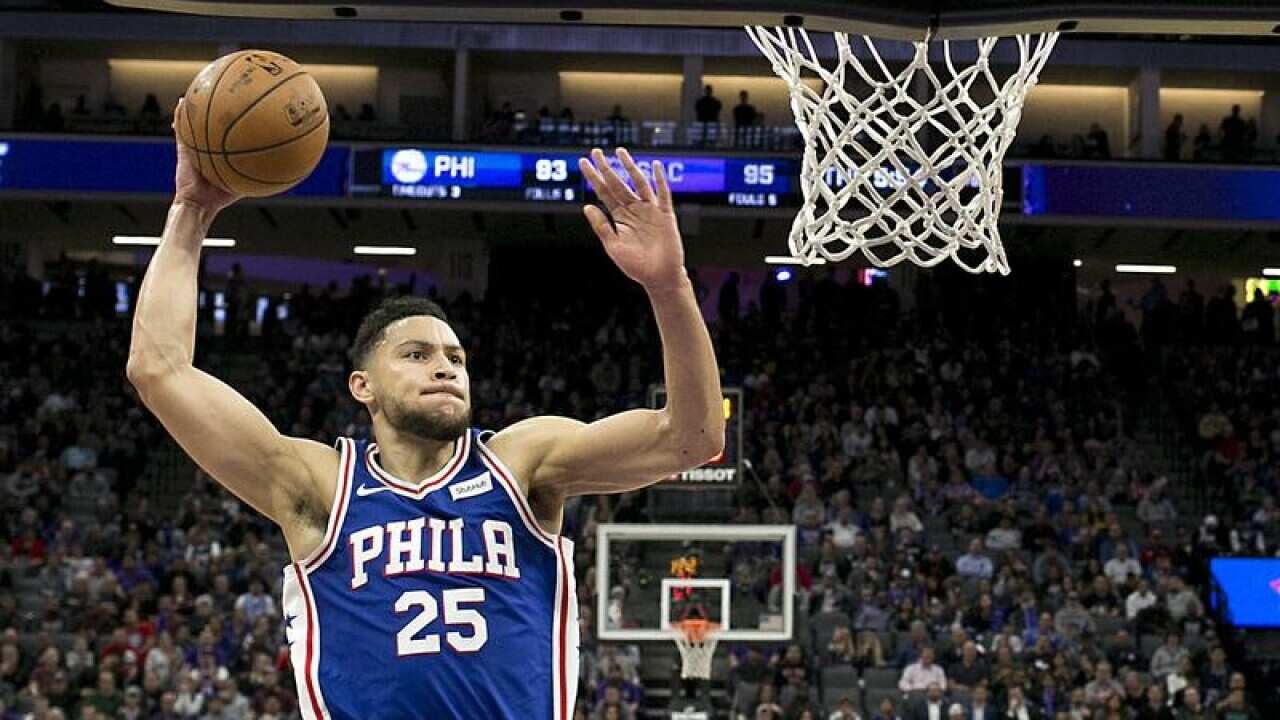 Philadelphia 76ers guard Ben Simmons jumping for a dunk
