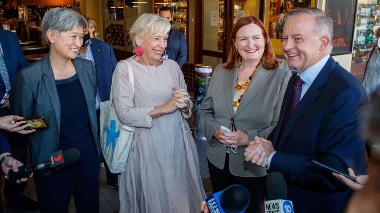 (L-R) Shadow Foreign Affairs Minister Penny Wong, SA Food Icon Maggie Beer, Labor candidate for Boothby Louise Miller-Frost and Federal Opposition Leader Anthony Albanese during a visit to the Central Markets in Adelaide, Friday, April 8, 2022.