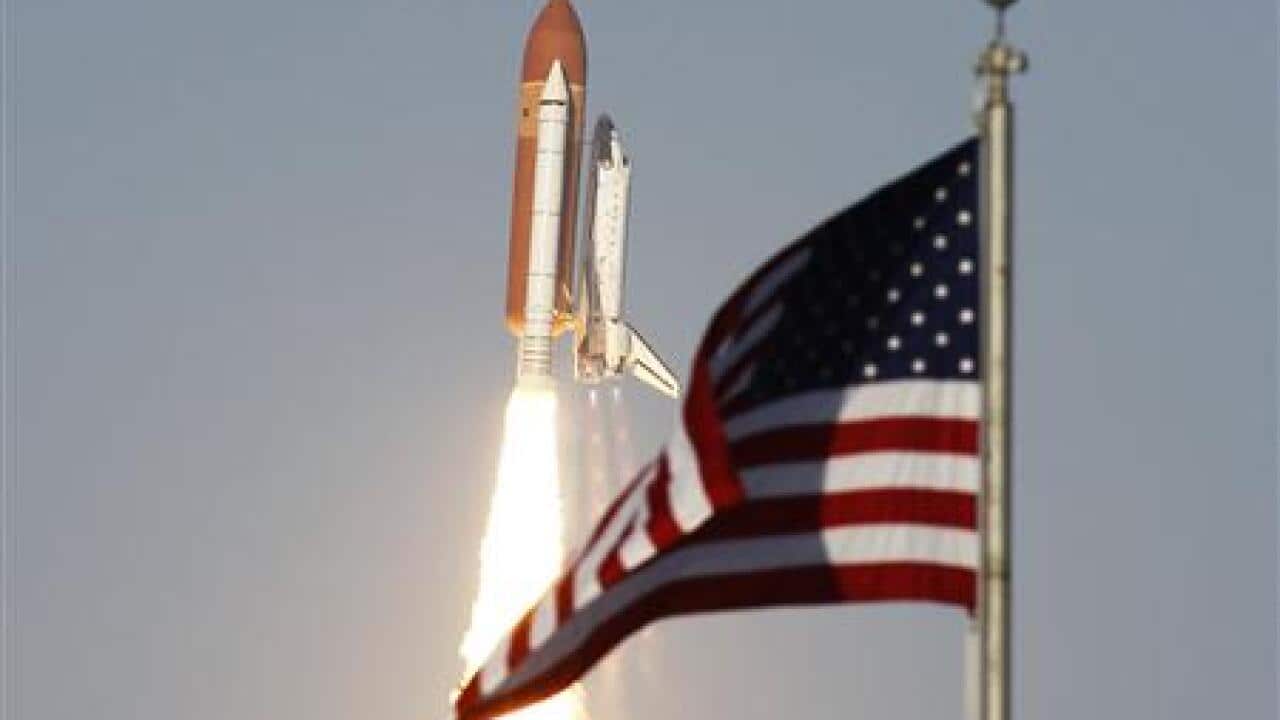 space-shuttle-discovery-blasts-off-from--1754298647-large.jpg