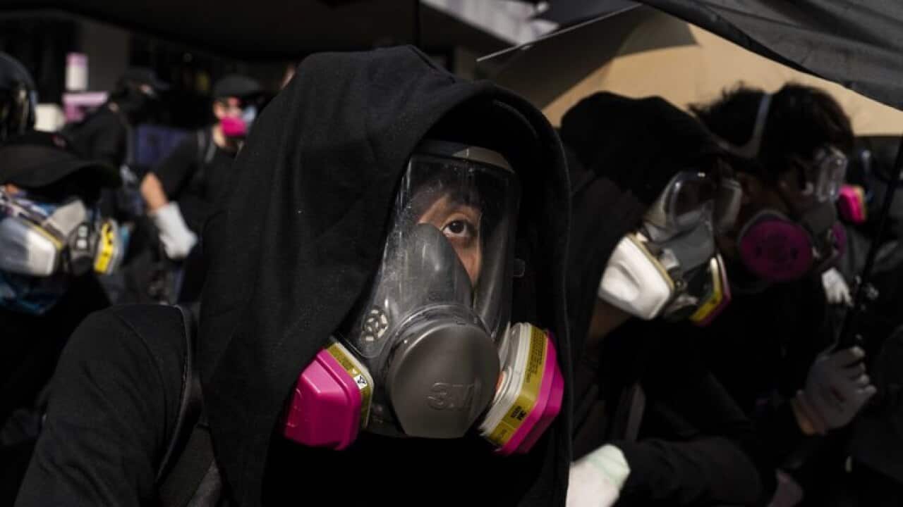 Hong Kong Police Fire Tear Gas as Protesters Defy Ban