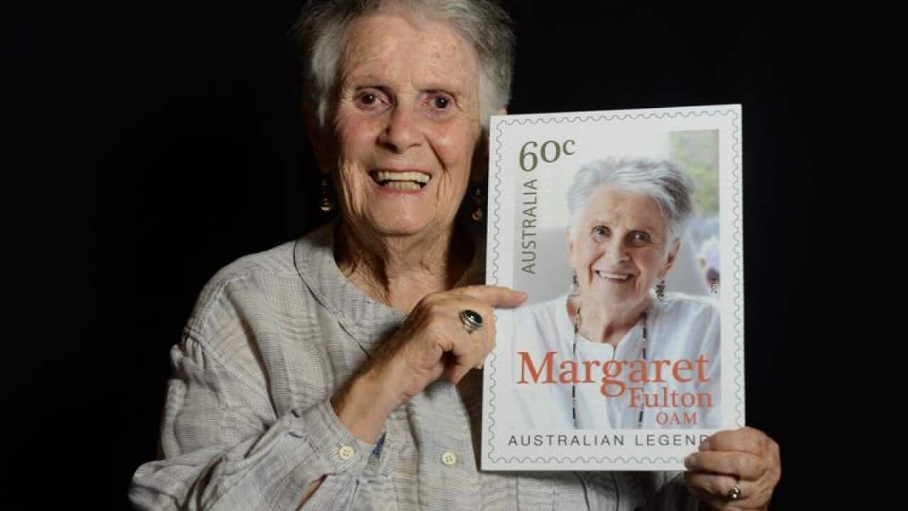 Margaret Fulton, in 2014, with Australia Post stamp in her honour.