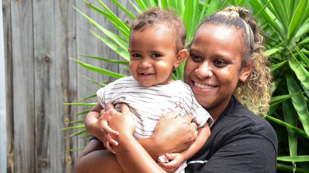 Mackapilly Sebasio and child