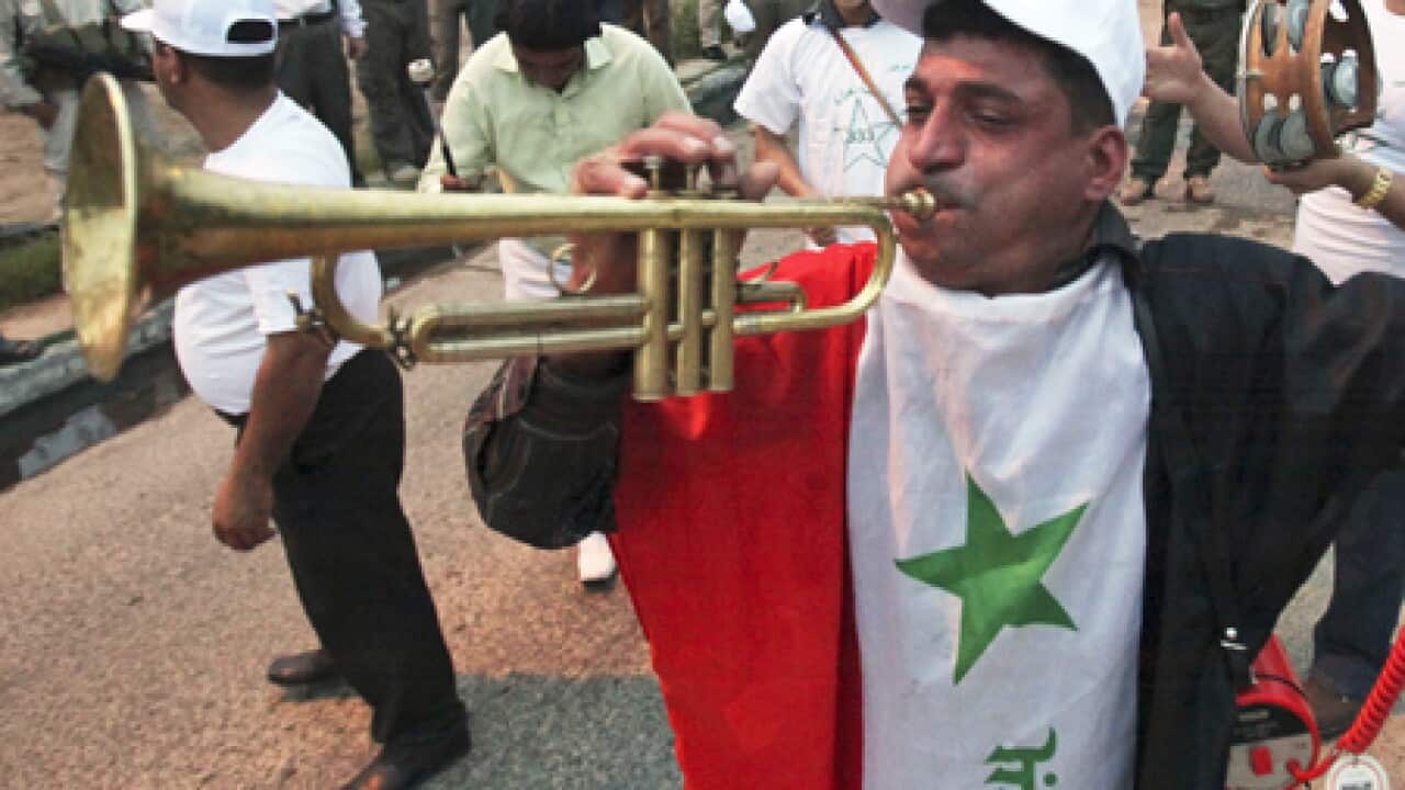 iraq_vote_trumpet_100412_L_aap_350737527