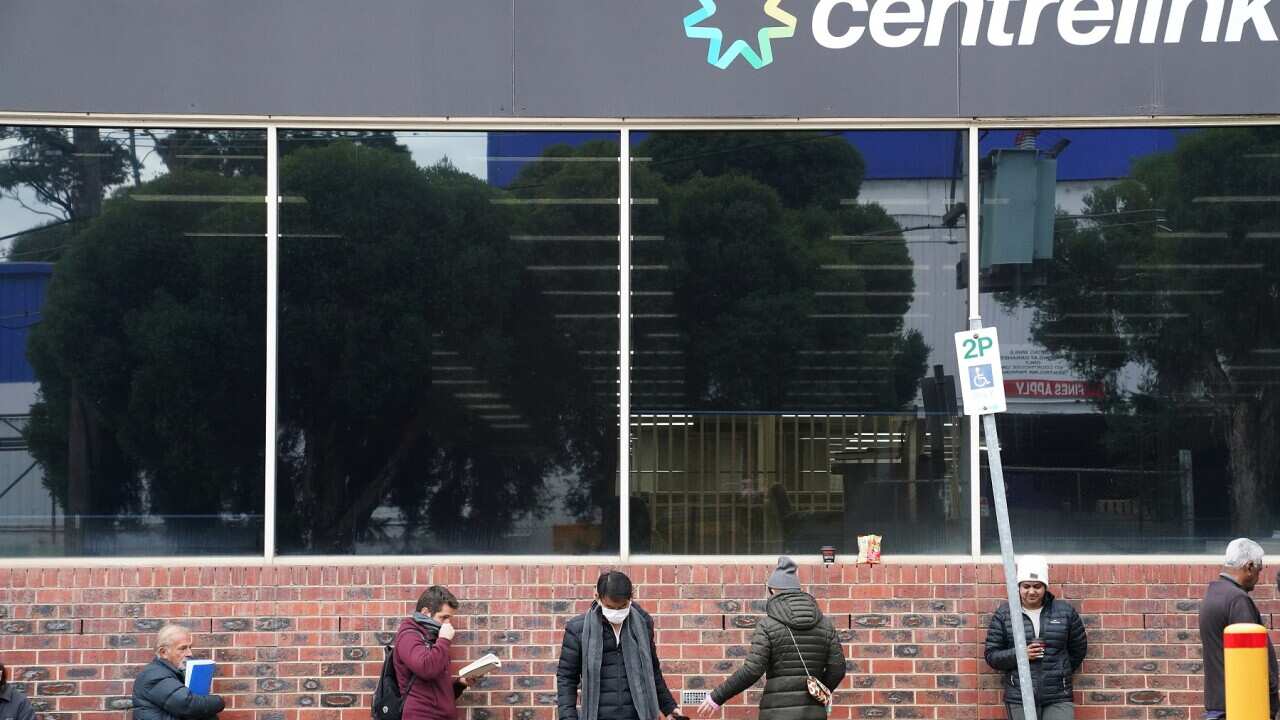 People queueing outside a Centrelink office in Melbourne