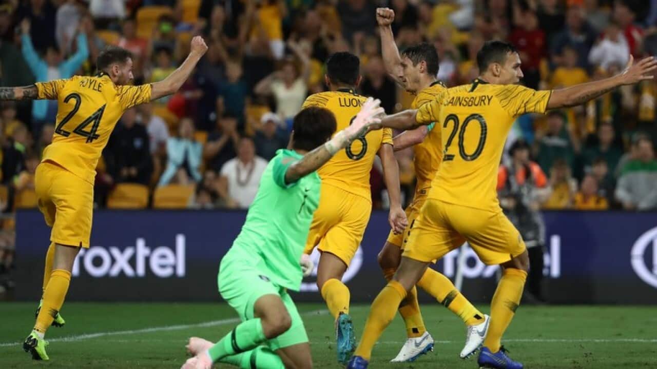 Massimo Luongo celebrates after scoring for the Socceroos against South Korea