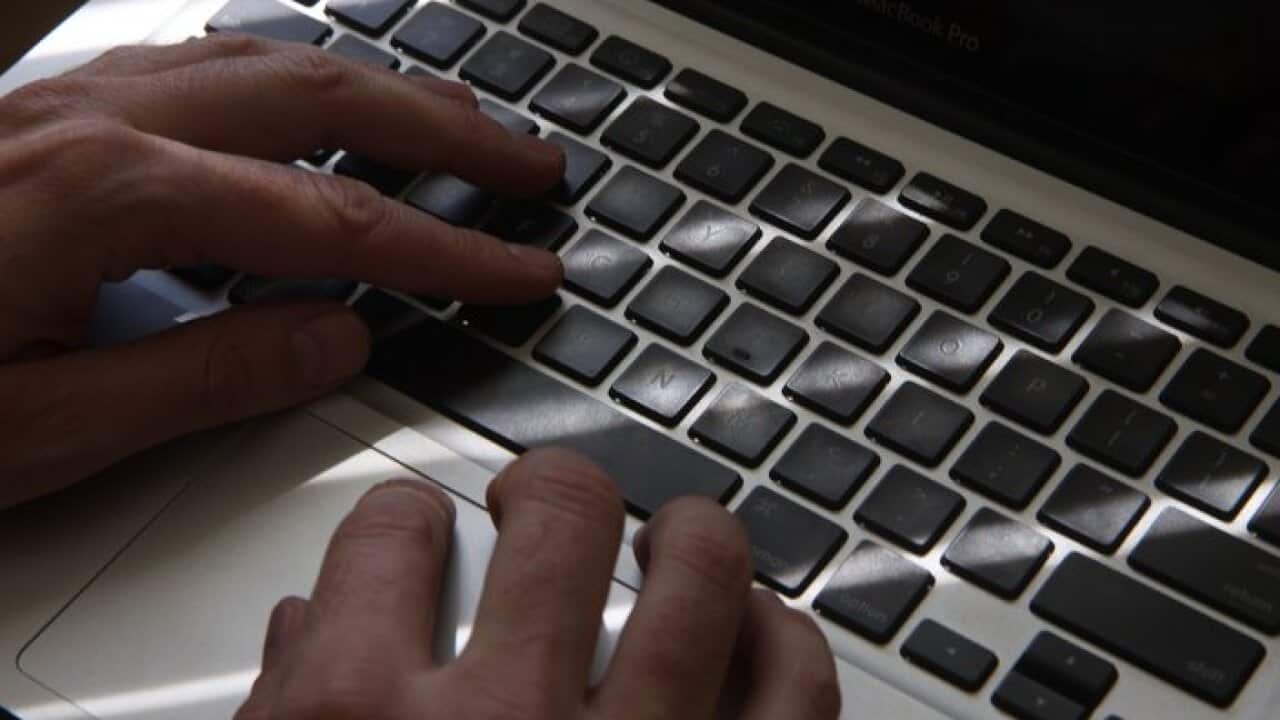 A man using a laptop, Sydney, Monday, Sept. 10, 2012