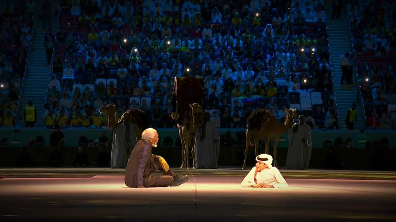 Morgan Freeman with Ghanim Al-Muftah at the World Cup Opening ceremony (SBS).jpg