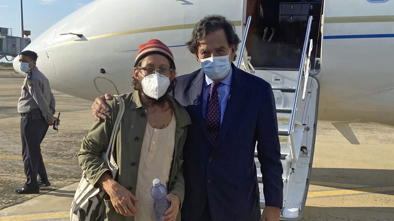 Former US Ambassador to the UN Bill Richardson, right, poses with released journalist Danny Fenster in Naypyitaw, Myanmar, Monday, 15 November, 2021.
