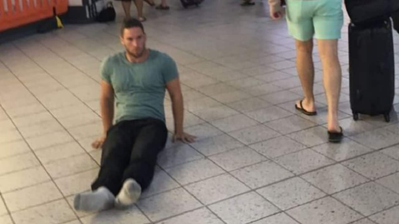 Justin Levene dragging himself around the airport.