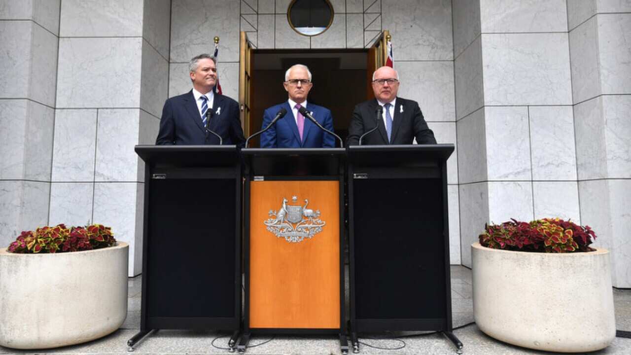 Minister for Finance Senator Mathias Cormann, Prime Minister Malcolm Turnbull and Attorney-General George Brandis .