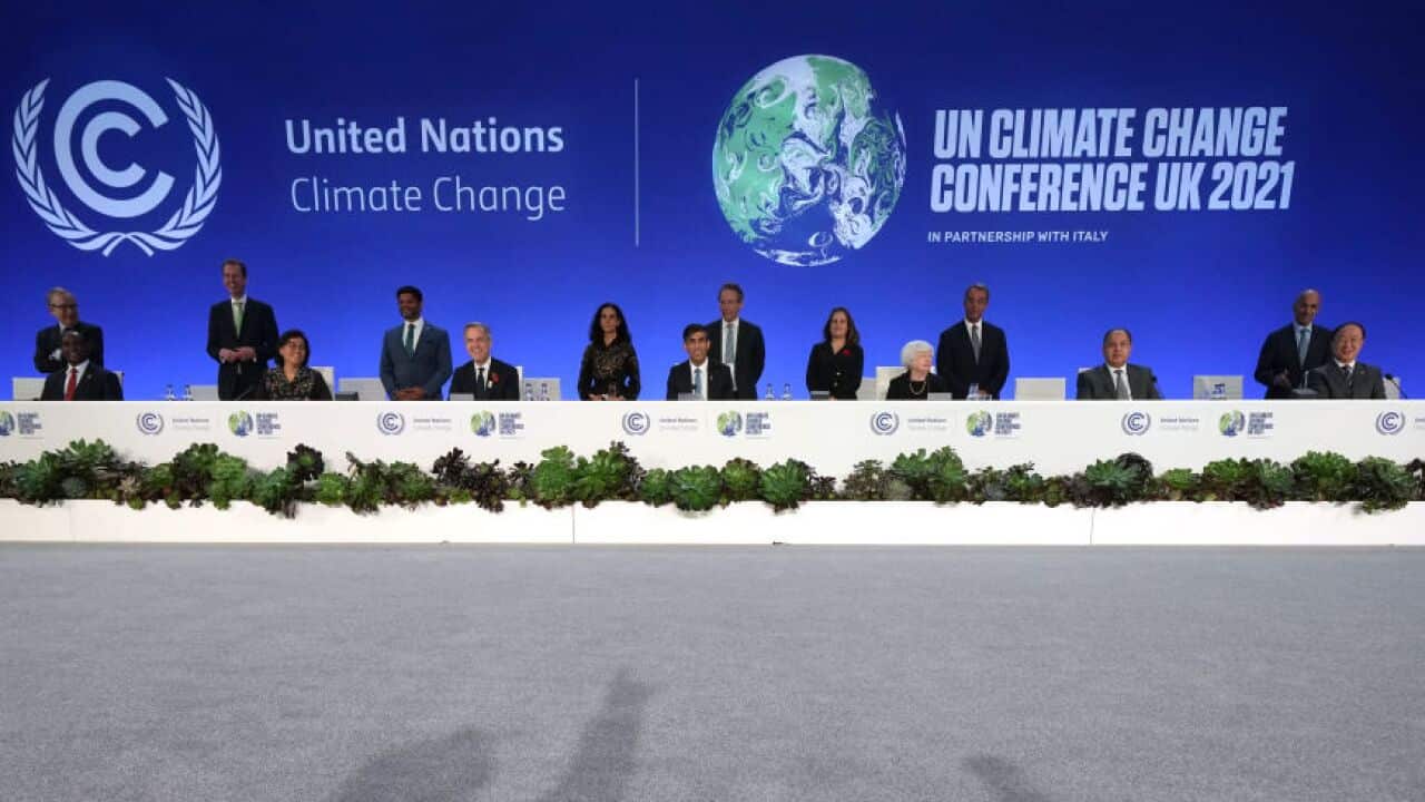 World leaders pose for a picture at the COP26 climate summit in Glasgow, 3 November 2021.