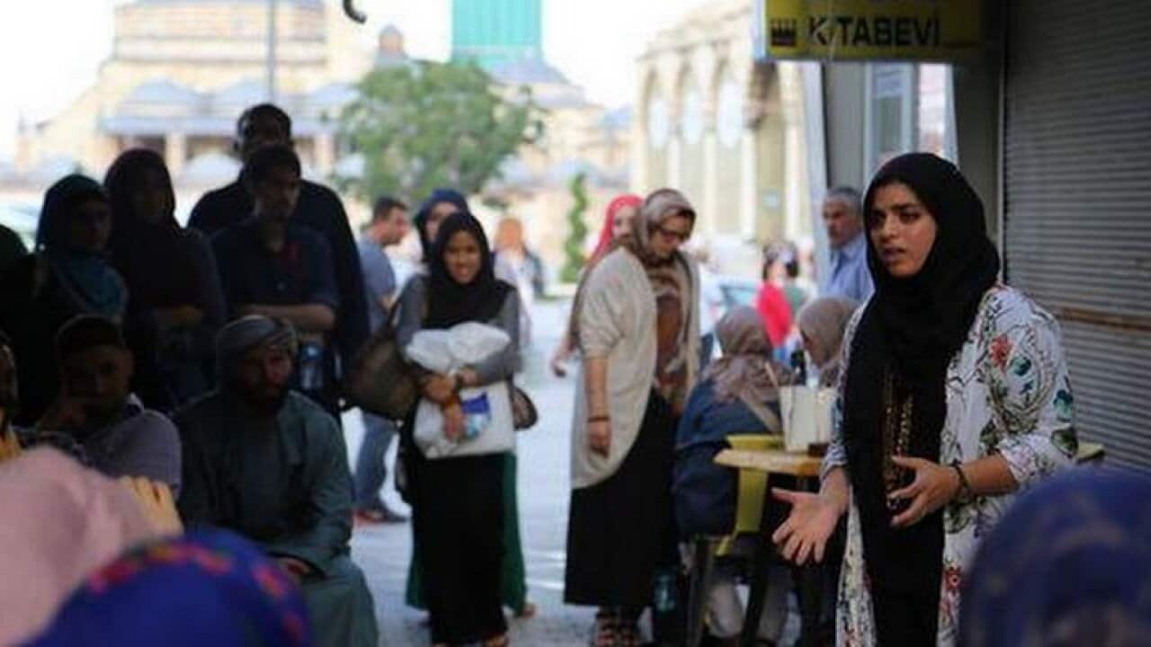 Zainab Zahra Syed performing on the street