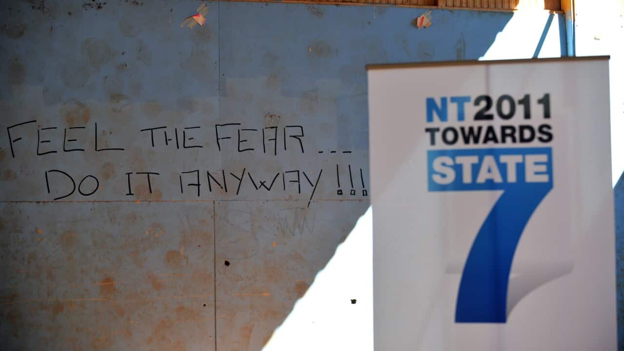 A banner promotes a meeting for the statehood forum at the local basketball court in Elliott, in the Northern Territory on Tuesday, Feb. 16, 2010.