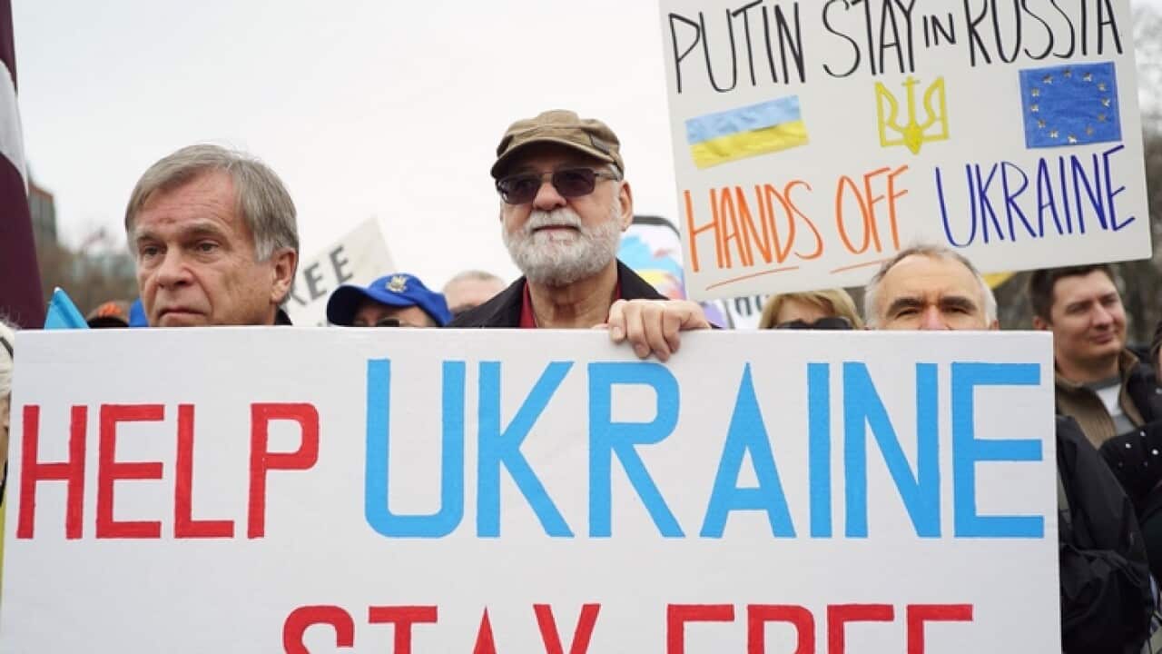 Demonstrators take part in a protest against Russia and President Vladimir Putin on March 26, 2015 in front of the White House in Washington, DC. AFP PHOTO/MANDEL NGAN (Photo credit should read MANDEL NGAN/AFP/Getty Images)
