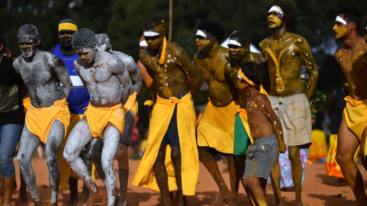 Clan members of the Yolngu people perform the Bunggul traditional dance during the Garma Festival (AAP)
