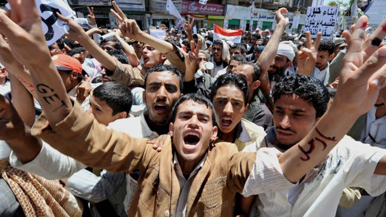 yemen_protest_group_l_110404_getty_721400814