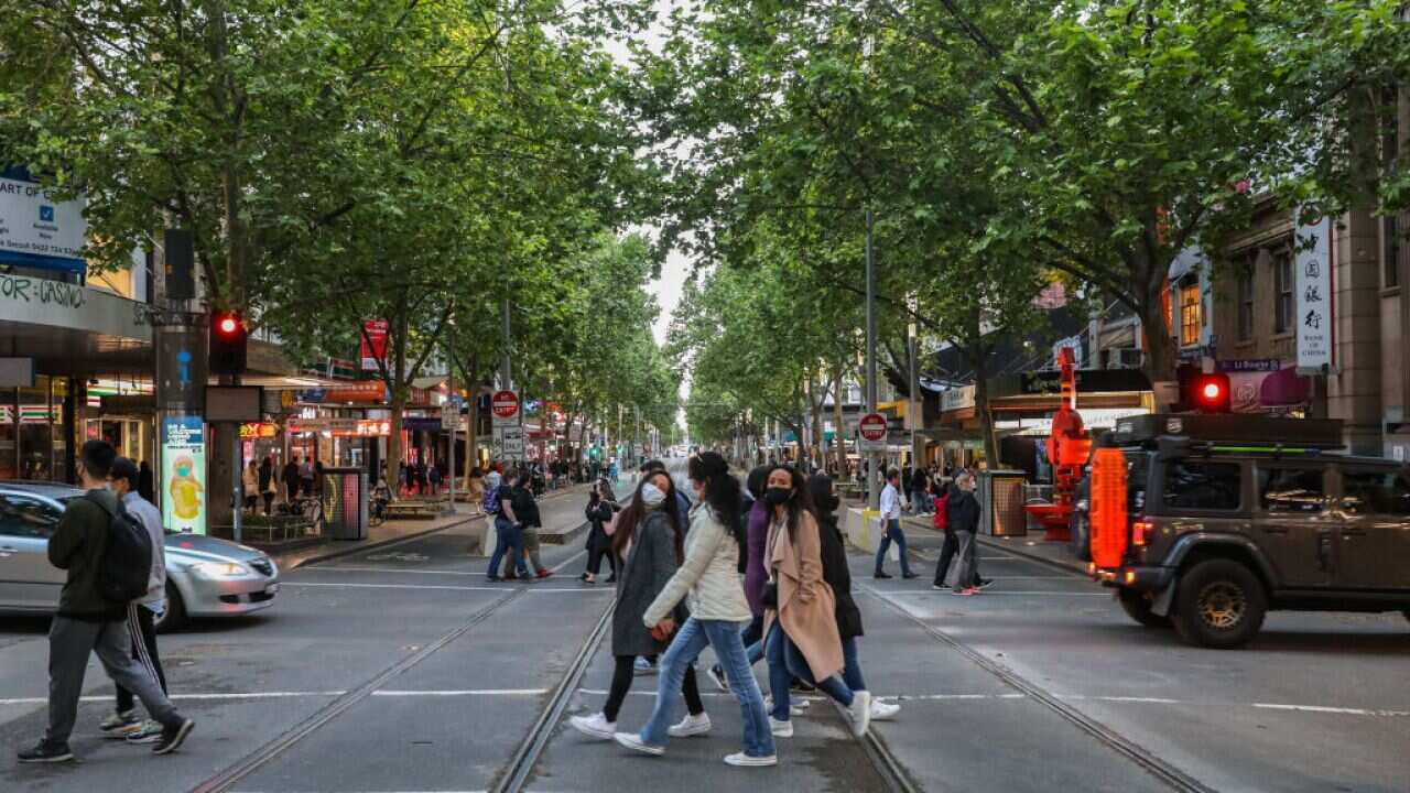 A general view of foot and car traffic on Swanston street on 29 October, 2021 in Melbourne.