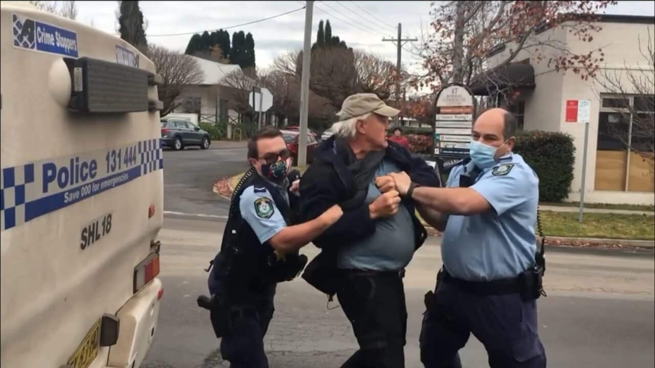 A screenshot from the video The Organic Store Bowral shared of the arrests.