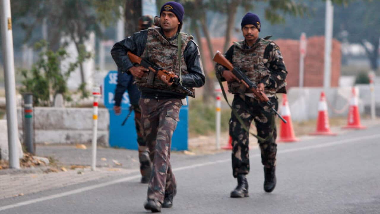 Indian soldiers patrol airbase after attack