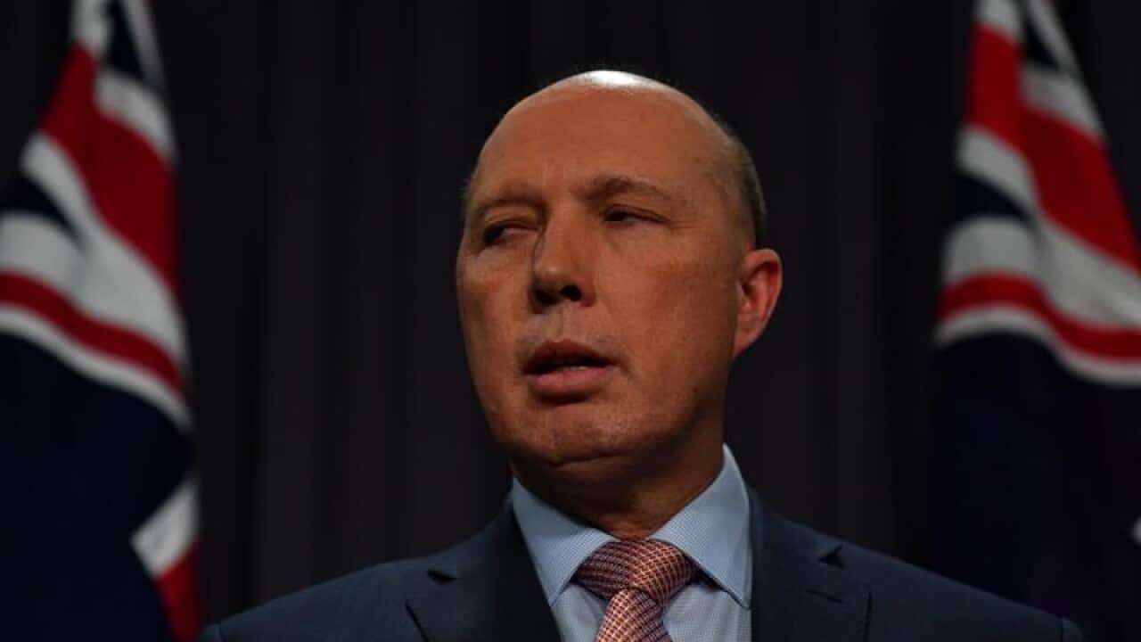 Minister for Home Affairs Peter DuttonThe ABC and News Corp have requested Peter Dutton halt investigations against their journalists.