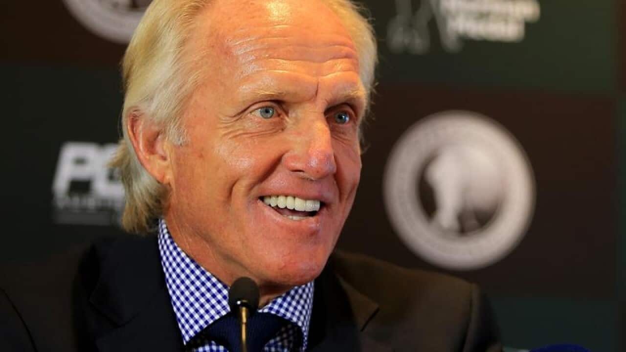Greg Norman speaks during a press conference.