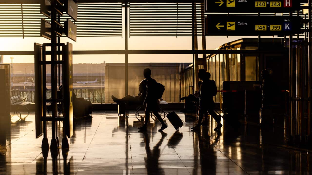 People walking inside a airport terminal
