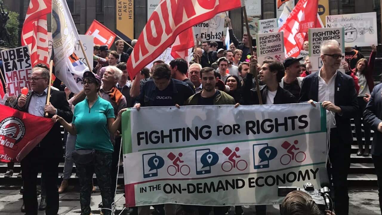 Hundreds protest against poor pay and conditions of food delivery riders in Melbourne.